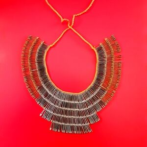 Cascading handcrafted safety-pin collar
